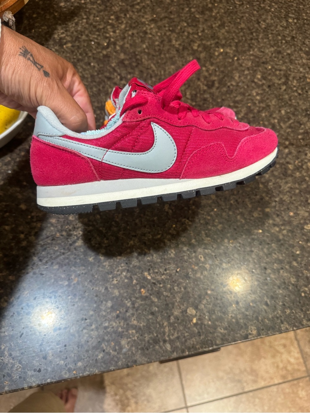 Nike woman’s or kids Hot Pink Suede Sneaker with gray Swoosh